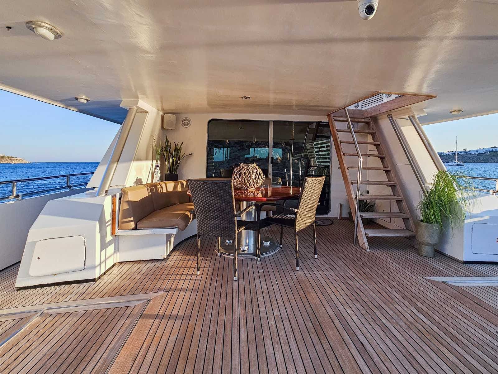 Lady Mirto's aft deck in golden-hour light