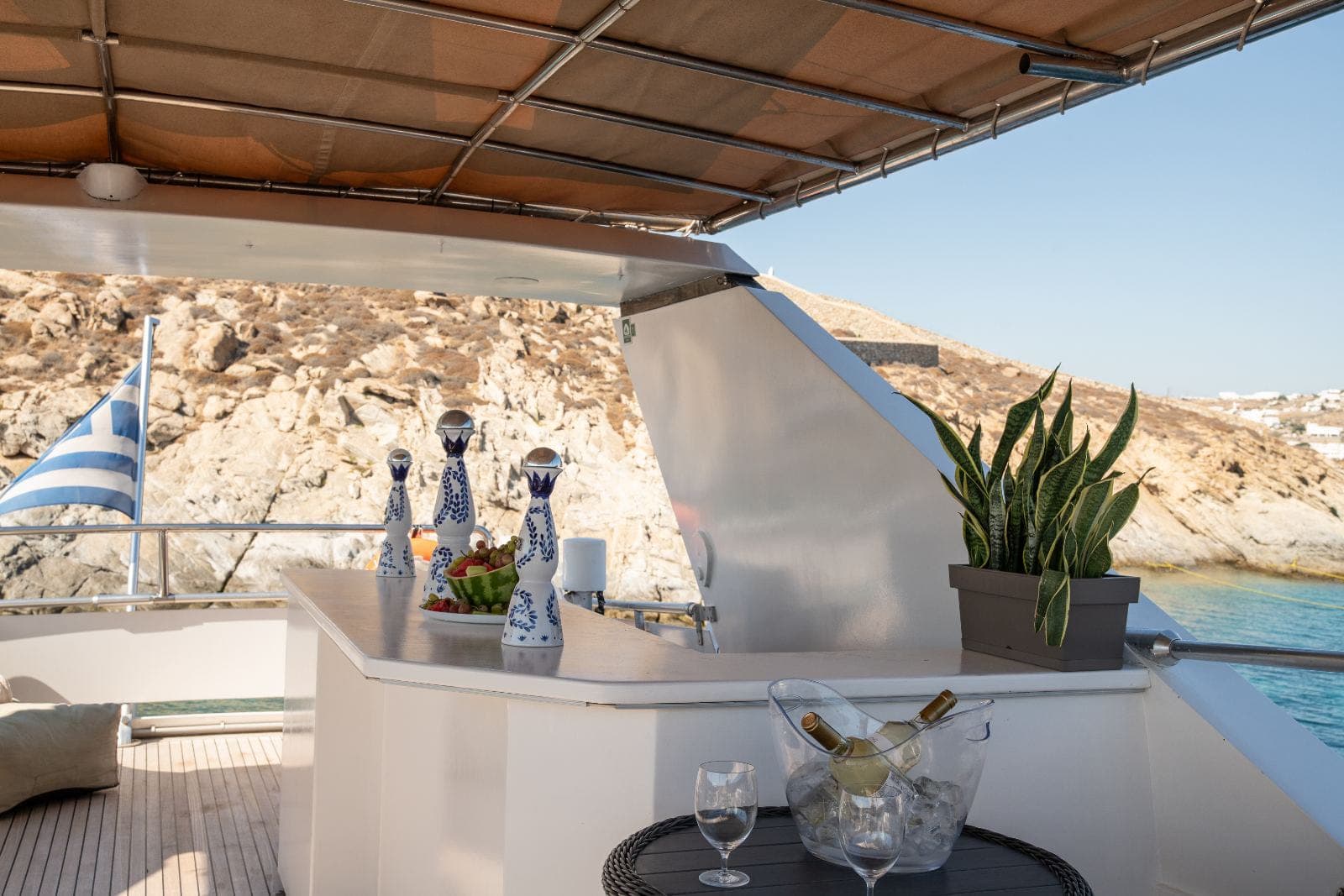 The flybridge bar aboard Lady Mirto, set for guests